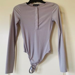 Never Worn Stylish Snap-up Bodysuit